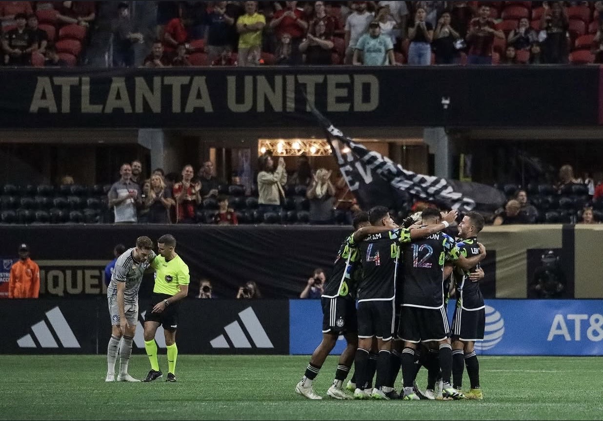 Atlanta United players celebrate at Mercedes-Benz Stadium